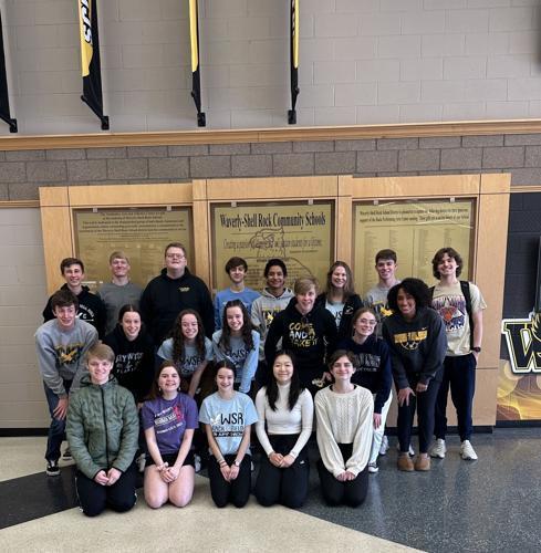 students in front of wsr community school banners